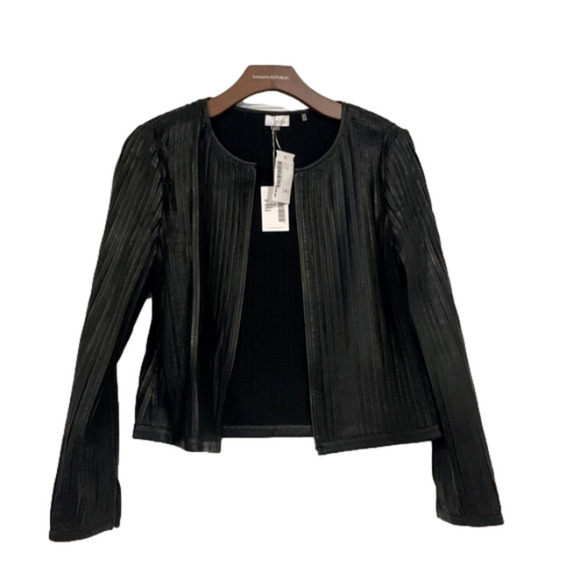 ecru Jackets & Blazers - Black leather strip jacket (it appears ribbed). brand new! Never worn